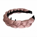 Detail of dusty pink satin padded headband with inner black teeth comb for volume - Pink