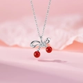 Silberne Kirsch-Halskette mit roten Perlen und weißem Zirkon auf rosa Farbverlauf - Silber/Rot