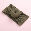 Army green knitted baby headband with donut knot detail on a soft pink background - Army Green