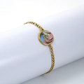 Gold stainless steel Figaro bracelet featuring a round marble-texture pendant with letter U - Abalone Shell / Letter U / Colorful