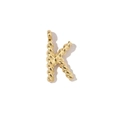 Detailed macro view of 18k gold plated stainless steel letter k pendant accessory - Letter K