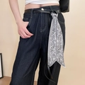 Detail of high waisted wide leg denim pants with paisley silk scarf belt accessory - White Silk Scarf Decorative Waist Chain