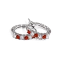 Silver hoop earrings featuring alternating red and white zircon stones in a sleek pave setting - Red