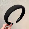 Padded black knit headband with hand made label and 14cm outer diameter measurement - Black Fabric Series