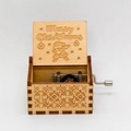Hand-cranked wooden music box with Merry Christmas engraving and festive Santa pattern - Christmas 26/Wood Color/Merry Christmas Santa Engraving