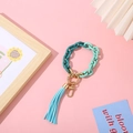 Green and mint acrylic link bracelet keychain with light blue tassel and gold clasp - Dark Green + Lake Blue