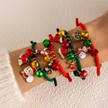 Detail of Christmas braided bracelets with Santa, reindeer and bell charms on knit fabric - Braided Reindeer Bell(25699-colour)