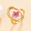 Gold stainless steel oval ring with real pink dried flower specimen inside the resin - Gold with Fuchsia Flower