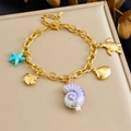 Gold-plated stainless steel charm bracelet with sea turtle shell and starfish pendants - Purple Snail Shell Starfish Style (B1739)