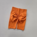 Bright orange high-waisted seamless scrunch butt fitness shorts for yoga and workout - Orange