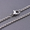 Detail of 2.5mm golden stainless steel pearl chain with secure lobster clasp closure - 20cm / Steel