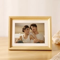 Modern light wood photo frame with natural grain and warm lifestyle tabletop display - Soft Wood Color Frame + Mat