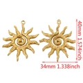 Set of two vintage golden sun pendants with spiral design and wavy rays for DIY jewelry - Gold Spiral Flame Sun Style D