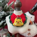 Detailed macro view of handmade crochet Christmas pet collar with a bell ornament - One Size / Christmas Bell (Character)