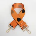 Detail of orange nylon bag strap with heart patterns and gold metal lobster clasps - No. 8 + Gold Hook (Orange with Black/Grey Heart)