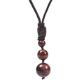 Detailed view of 16MM tiger eye stone necklace with adjustable brown braided rope - Necklace Only / Red Tiger Eye Necklace