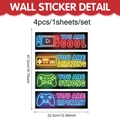 Vue détaillée de 4 stickers muraux manettes de jeu néon avec dimensions 32x47,5cm - Cool Motivationnel (CT24Y11566T_R) / 4 pièces/ensemble