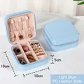 Portable light blue PU leather jewelry box with zipper, measures 10x10x5cm - Zipper Style / Light Blue