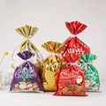 Multi-colored drawstring Christmas gift bags set with festive reindeer and Santa patterns - 30-Piece Set (5 each)