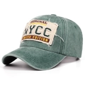 Close-up of vintage green washed cotton baseball cap with distressed embroidery detail - Adjustable / Sea Green