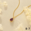 Detail of purple teardrop gemstone pendant on a gold cuban link necklace for women - Waterdrop Amethyst