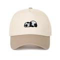 Close-up of a two-tone baseball cap with a sleeping panda embroidery on a beige crown - Adjustable / Khaki
