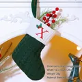 Green knitted Christmas stocking with red letter X embroidery and white cuff trim - Letter X / Dark Green