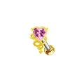 Macro shot of pink heart zircon piercing stud with gold demon tail design elements - Pink Devil Heart Style (#14)