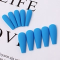 Detail view of matte royal blue coffin press-on nails with a frosted texture finish - Sky Blue