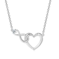 Macro detail of silver infinity heart pendant necklace with shimmering zircon stones - Necklace / Silver