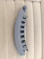 Close-up of a matte blue-gray banana hair clip featuring a multi-tooth interlocking design - Matte Light Blue