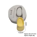 White silicone baby shoe mold with yellow fondant bootie for cake decorating - Style 2 (Single Shoe) / Gray