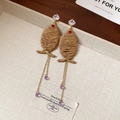 Detail view of woven rattan earrings with purple crystal teardrop tassels and gold chains - 33# 925 Sterling Silver Earring Post - Gold/Coffee - Woven Fish Pendant
