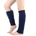 Detail of dark blue cable knit leg warmers featuring soft plush faux fur cuffs on model - Plush Lined Cable Knit / Navy Blue