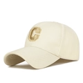 Creamy beige baseball cap featuring a golden 3D embroidered letter C on textured fabric - Adjustable / Light Beige