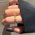 Modern wide gold ring with textured surface shown on model hand with purple nails - Wide Textured Bumpy Style (TJZ078) / Gold Narrow Version