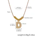 Detail view of letter D zircon pendant on colorful rope chain with size dimensions - D Letter Gold Necklace (RP019)