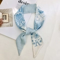 Sky blue twilly silk scarf with floral textures and letter K print in elegant knot style - Style K (Blue/White Fresh Floral)
