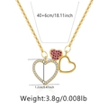 Detail view of gold-plated stacked hearts necklace with pink and white crystal accents - Tri-Color Triple Linked Heart (KN0224)