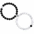 Macro shot of magnetic couples bracelets with matte black and white marble stone beads - Matte Black & White Turquoise Criss-Cross Magnetic Style (Style-08)
