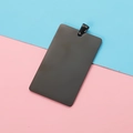 Polished black rectangular stainless steel pet tag pendant with hanging ring on a dual-tone background - Black With Clasp