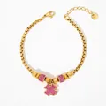 Golden clover bracelet with pink crystals and adjustable chain for women - Gold + Pink Zirconia