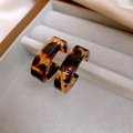 Classic C-shaped leopard print resin earrings with a glossy finish on grey velvet - 50# Steel Needle - Brown - Hoop