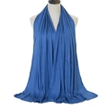 Versatile mid-blue mercerized cotton scarf for women shown on a fashion mannequin - Denim Blue