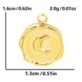 Macro detail of gold round crescent moon pendant showing dimensions 1.6cm by 1.3cm - Gold Moon