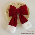 Red velvet Christmas bow with white faux fur ball decor, medium size 22cm x 15cm - M