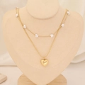 Close-up of double-layer gold necklace featuring pearl heart beads and a heart pendant - Pearl Spacer Heart Style (7#)