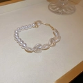 Vintage geometric bracelet with white heart-shaped pearls and gold metal clasp - Pearl Heart Link Bracelet