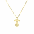 Macro view of polished 18k gold plated mushroom pendant and delicate O-chain necklace - Necklace T
