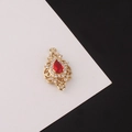 Close-up of gold teardrop connector with red pear-cut stone and micro-pave cubic zirconia - Red